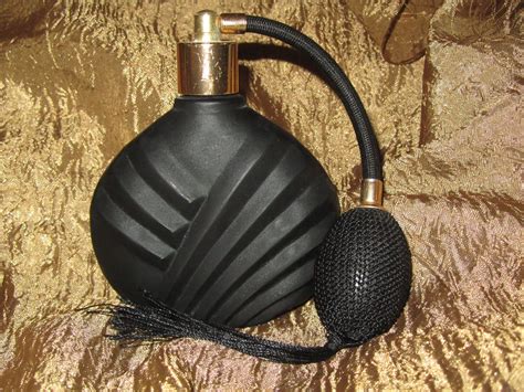 vintage black glass perfume bottle.